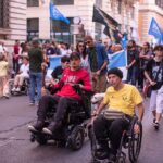 Manifestanti in corteo al Disability Pride Italia di Roma